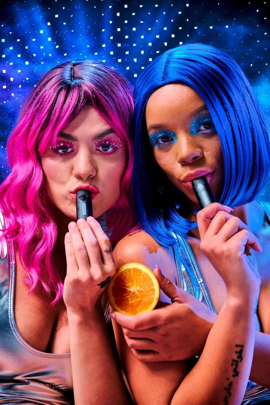 Two models with Hellavated products in a colorful galaxy setting