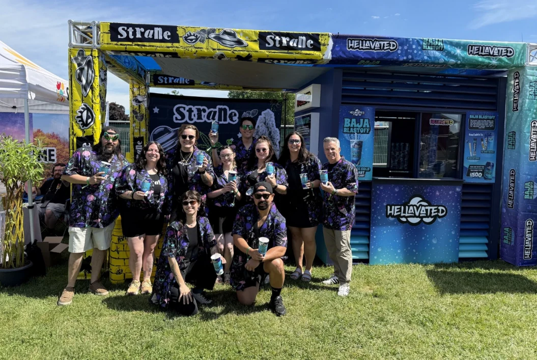 The event team in front of the Strane and Hellavated Flower Expo booth