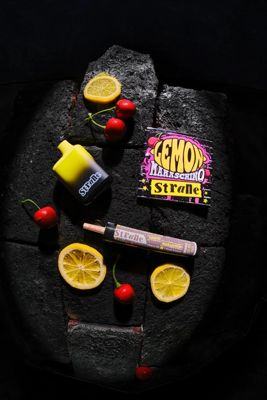 Lemon Maraschino pouch, vape and pre-roll tube photographed together